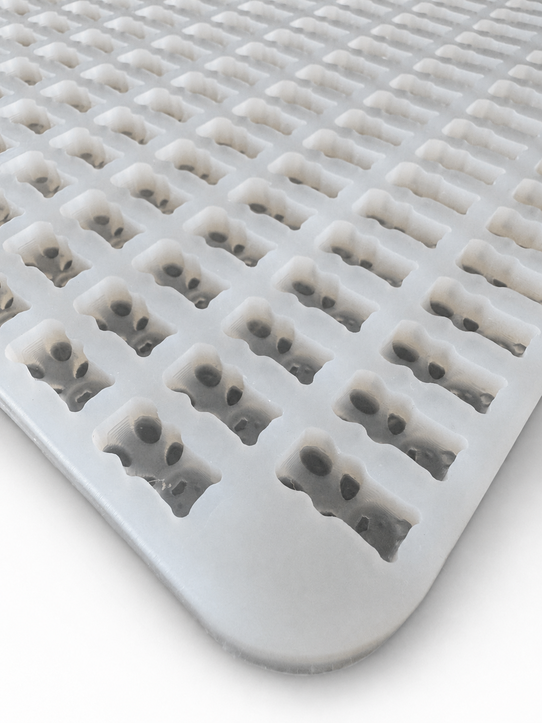 Commercial half-sheet gummy bear mold with 296 cavities