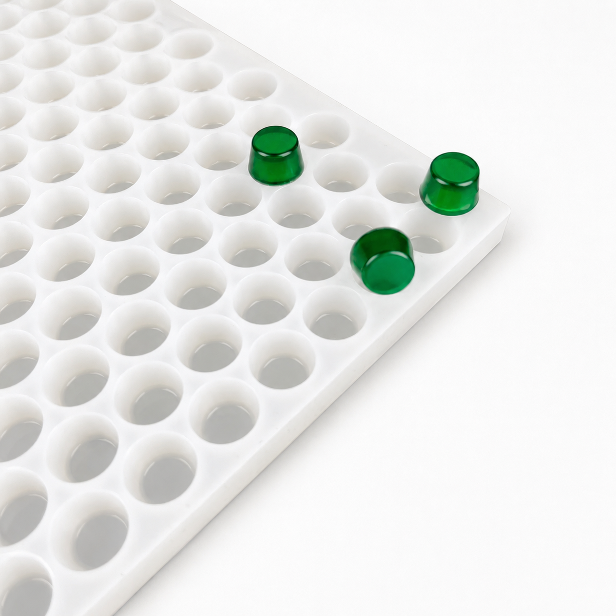 3mL gumdrop gummy mold with emerald-green gummies on a white background