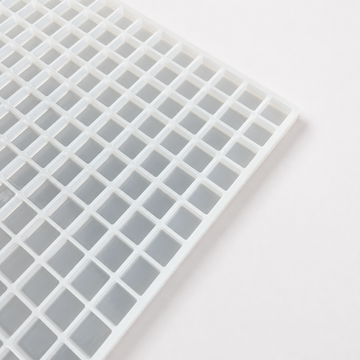 Angled view of 3.5mL square gummy mold with 221 cavities