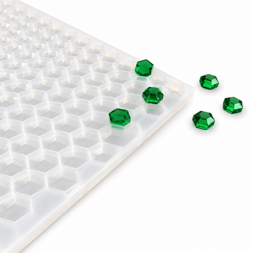 3mL hexagon gem gummy mold with 263 cavities and emerald green gummies on a white background