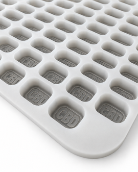 Angled view of 4mL brick gummy mold with 185 CBD imprint cavities
