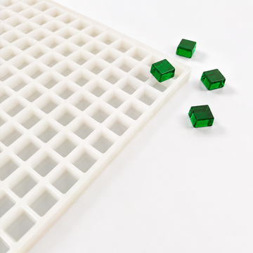 4mL Square Gummy Mold - 192 Cavities with emerald green gummy samples on white background